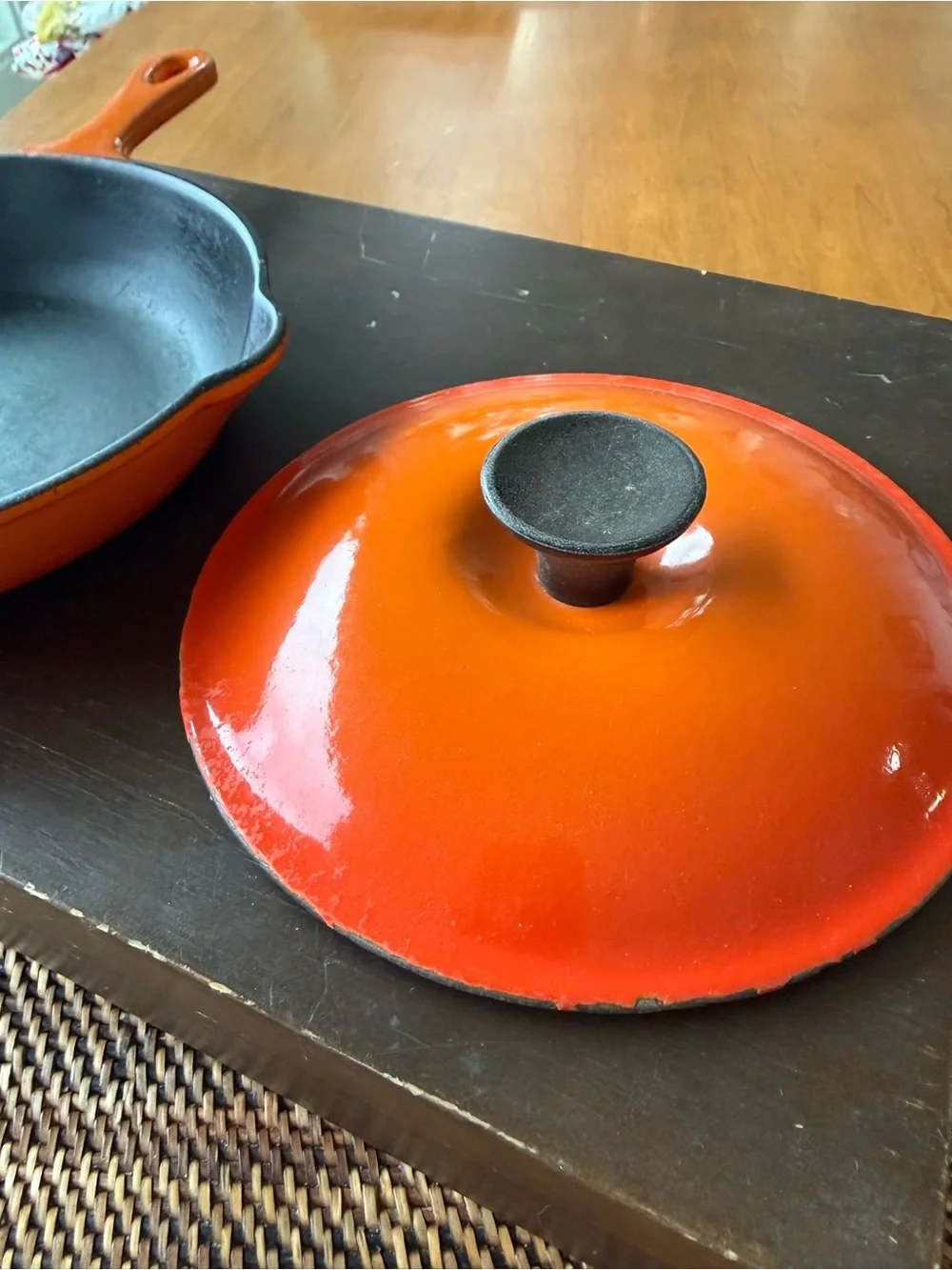 Le Creuset Orange Enameled Cast Iron Skillet. Read about the lid.